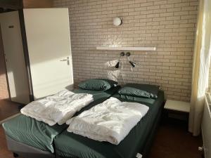 Ένα ή περισσότερα κρεβάτια σε δωμάτιο στο Appartement Zeeland, Clipper 25 +29 φωτογραφίες
