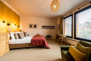 Krevet ili kreveti u jedinici u okviru objekta A Place Antwerp - Boutique Suites & Flats - Vrijdagmarkt 1