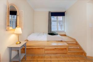 Posteľ alebo postele v izbe v ubytovaní Prime Location Apartment