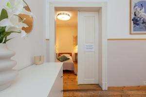 Posteľ alebo postele v izbe v ubytovaní Prime Location Apartment