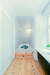 Posteľ alebo postele v izbe v ubytovaní Prime Location Apartment