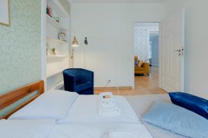 Posteľ alebo postele v izbe v ubytovaní Prime Location Apartment