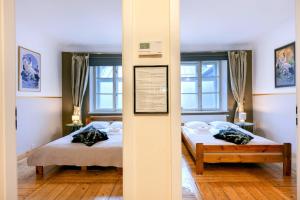 Posteľ alebo postele v izbe v ubytovaní Prime Location Apartment