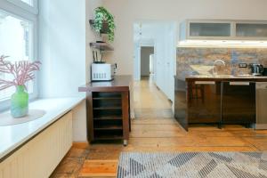 Kuchyňa alebo kuchynka v ubytovaní Prime Location Apartment