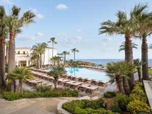 Bazén v ubytovaní Grecotel Marine Palace & Aqua Park alebo v jeho blízkosti