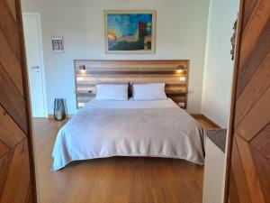 Postel nebo postele na pokoji v ubytování ReBorn Room