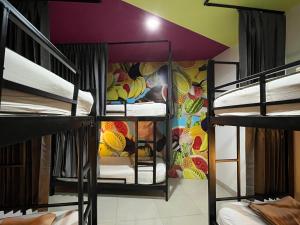 a room with three bunk beds in a hostel at Everyday Bangkok Hostel in Bangkok +15 photos