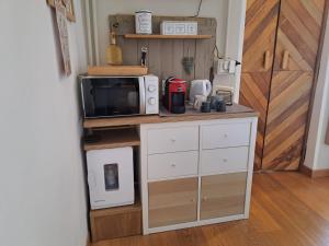 Kuchyň nebo kuchyňský kout v ubytování ReBorn Room