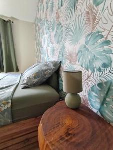 Postel nebo postele na pokoji v ubytování Monstera Lodge