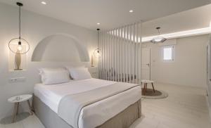 Кровать или кровати в номере Finikas Hotel