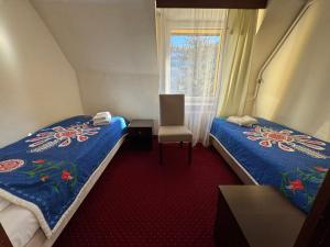 Katil atau katil-katil dalam bilik di Dafne Zakopane +132 gambar