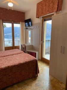 A bed or beds in a room at Albergo Rusall