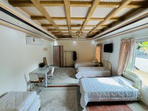 Postelja oz. postelje v sobi nastanitve Hostel Erfan