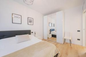 Ένα ή περισσότερα κρεβάτια σε δωμάτιο στο Resminik Home
