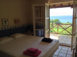 A bed or beds in a room at Villa Bouboule