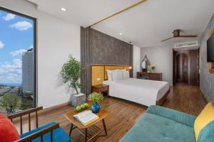 Giường trong phòng chung tại White Sand Boutique Hotel
