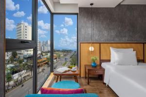 Giường trong phòng chung tại White Sand Boutique Hotel