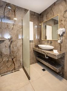 Ένα μπάνιο στο Vlashi Apartments +77 φωτογραφίες