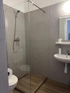 Kúpeľňa v ubytovaní Hungaria Apartments