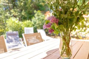 En have udenfor Le Cottage l Pool & Beachside l Shellter Rentals