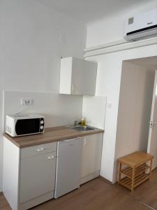 Kuchyňa alebo kuchynka v ubytovaní Hungaria Apartments