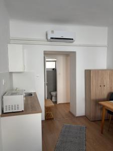 Kuchyňa alebo kuchynka v ubytovaní Hungaria Apartments