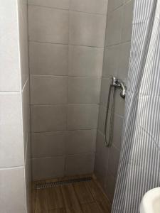 Kúpeľňa v ubytovaní Hungaria Apartments