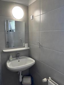 Kúpeľňa v ubytovaní Hungaria Apartments