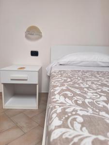 Postel nebo postele na pokoji v ubytování Vecchio Frantoio Villa Rosa