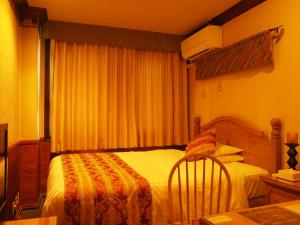 Postel nebo postele na pokoji v ubytování Hotel Gasthof
