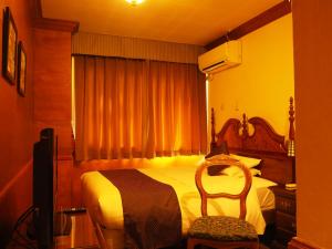Postel nebo postele na pokoji v ubytování Hotel Gasthof