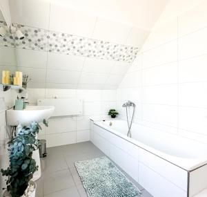 Łazienka w obiekcie Aranyeső Apartmanházak No.1