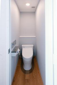 a bathroom with a white toilet in a room at Boston Plaza Kusatsu Biwa Lake - Vacation STAY 15460v in Kusatsu