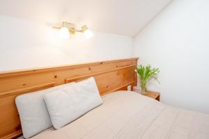 Posteľ alebo postele v izbe v ubytovaní Appartements Stranach