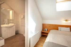 Posteľ alebo postele v izbe v ubytovaní Appartements Stranach