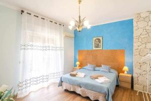 Postel nebo postele na pokoji v ubytování Mediterranean Charm villa con piscina al mare