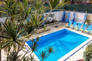Bazén v ubytování Mediterranean Charm villa con piscina al mare nebo v jeho okolí
