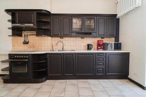 Kuchyňa alebo kuchynka v ubytovaní TOTU HOME Classic Apartment Gdynia