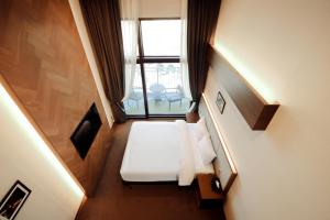 Postel nebo postele na pokoji v ubytování Pyeongchang Space hubt Hotel & Resort + 37 fotografií
