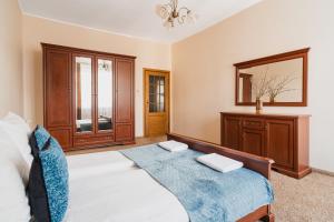 Posteľ alebo postele v izbe v ubytovaní TOTU HOME Classic Apartment Gdynia + 15 fotografií