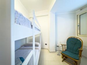 Ένα ή περισσότερα κρεβάτια σε δωμάτιο στο Casa Mariba Appartamento al mare piano terra +39 φωτογραφίες