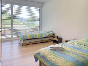 Postel nebo postele na pokoji v ubytování Auberge de Jeunesse Val-de-Travers