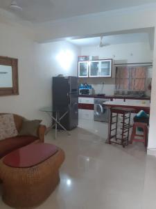 Kuchyň nebo kuchyňský kout v ubytování 2 bhk apartment baga kyle