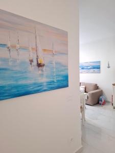 A seating area at CASA del SOLE APARTMENTS with garden