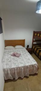 En eller flere senge i et værelse på T2 Edificio Aquazul + 4 billeder