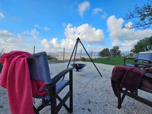 a blanket sitting on a chair with a swing at HideAway Lasa in Lasa