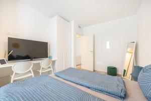 Postel nebo postele na pokoji v ubytování Wave Island RapI9 + 11 fotografií