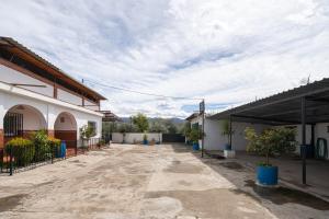 an empty parking lot in front of a building at Cortijo Candela in Granada