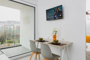 TV o dispositivi per l'intrattenimento presso Campus Lugano 45 wonderful Smart Suites in the university area