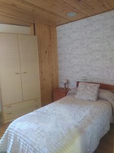 Cama o camas de una habitación en Casa Rural La Maestra